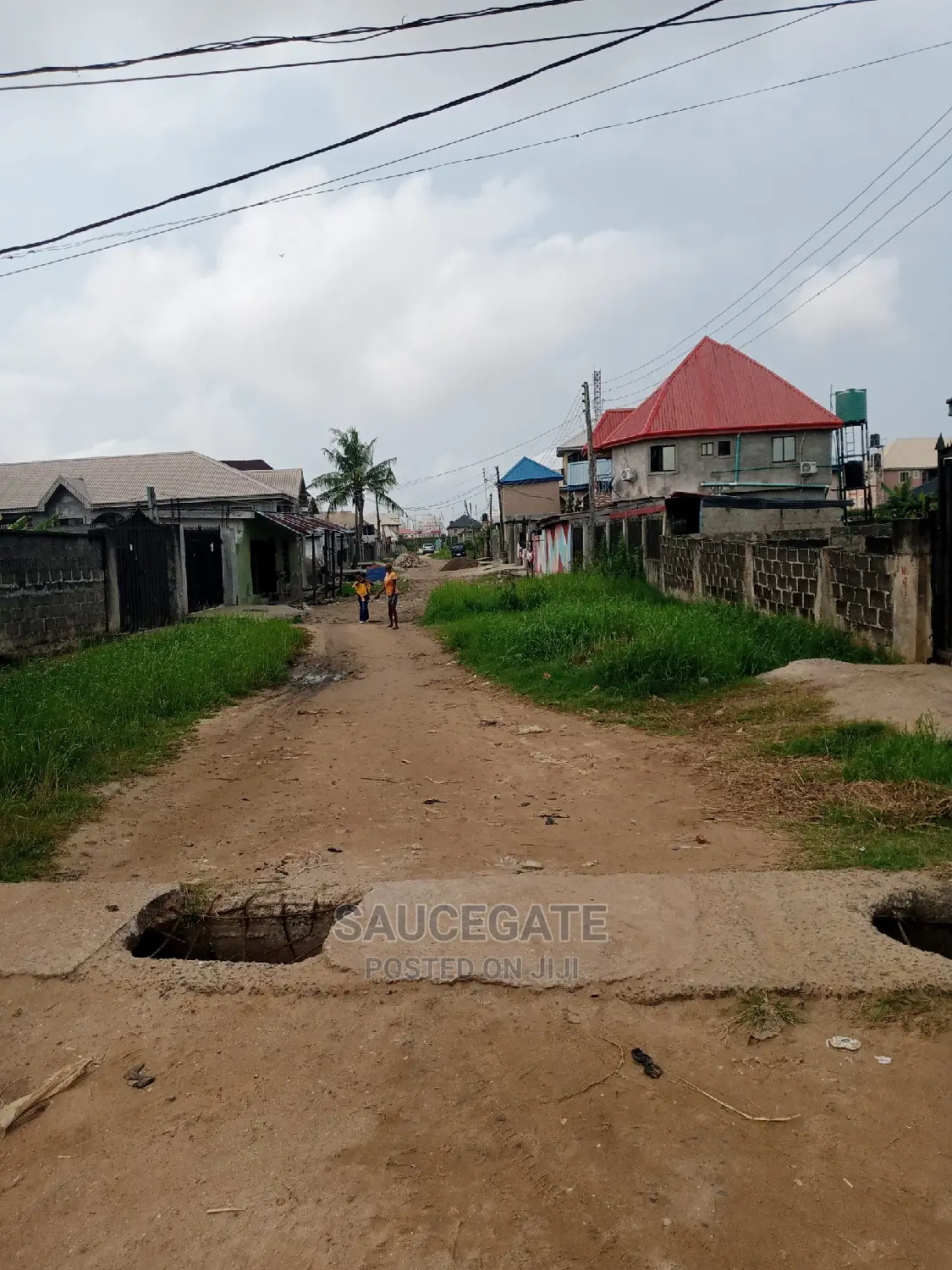 Half Plot for Sale at Ijegun Satellite Chemist Busstop Axis