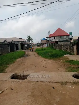 Half Plot for Sale at Ijegun Satellite Chemist Busstop Axis