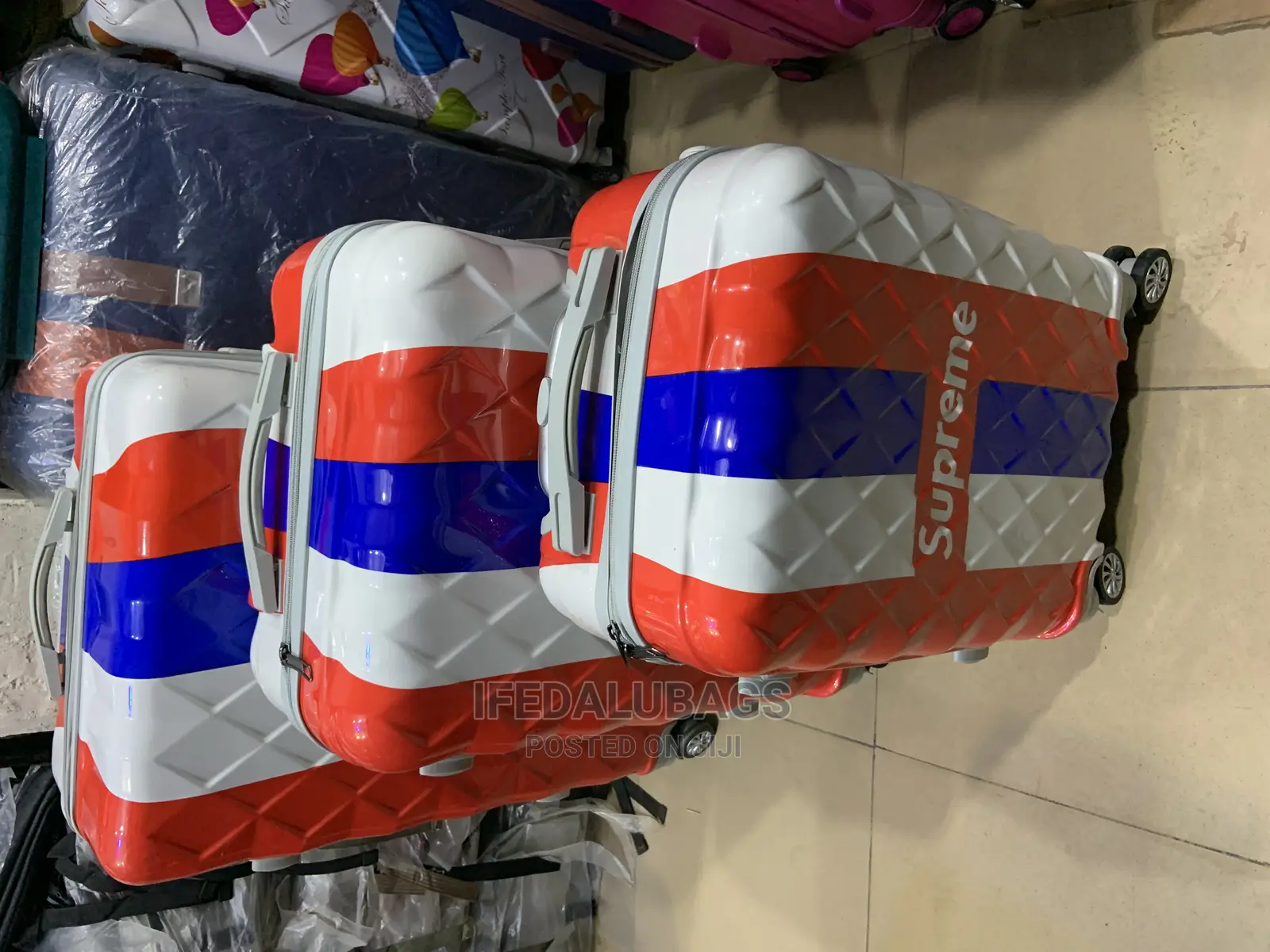Set of 3 Multicolored Plastic Traveling Luggage