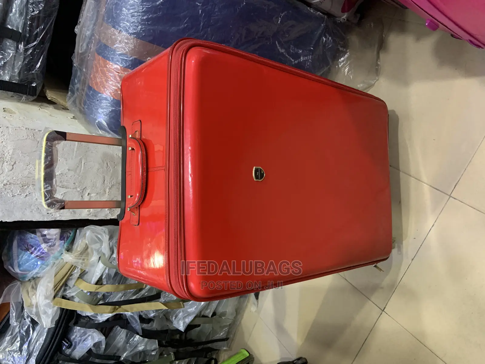 Big Size Imported Red Glossy Skin Traveling Luggage