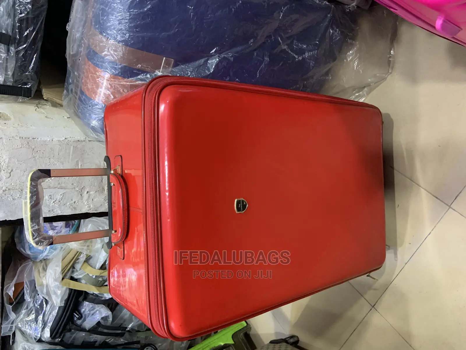 Big Size Imported Red Glossy Skin Traveling Luggage