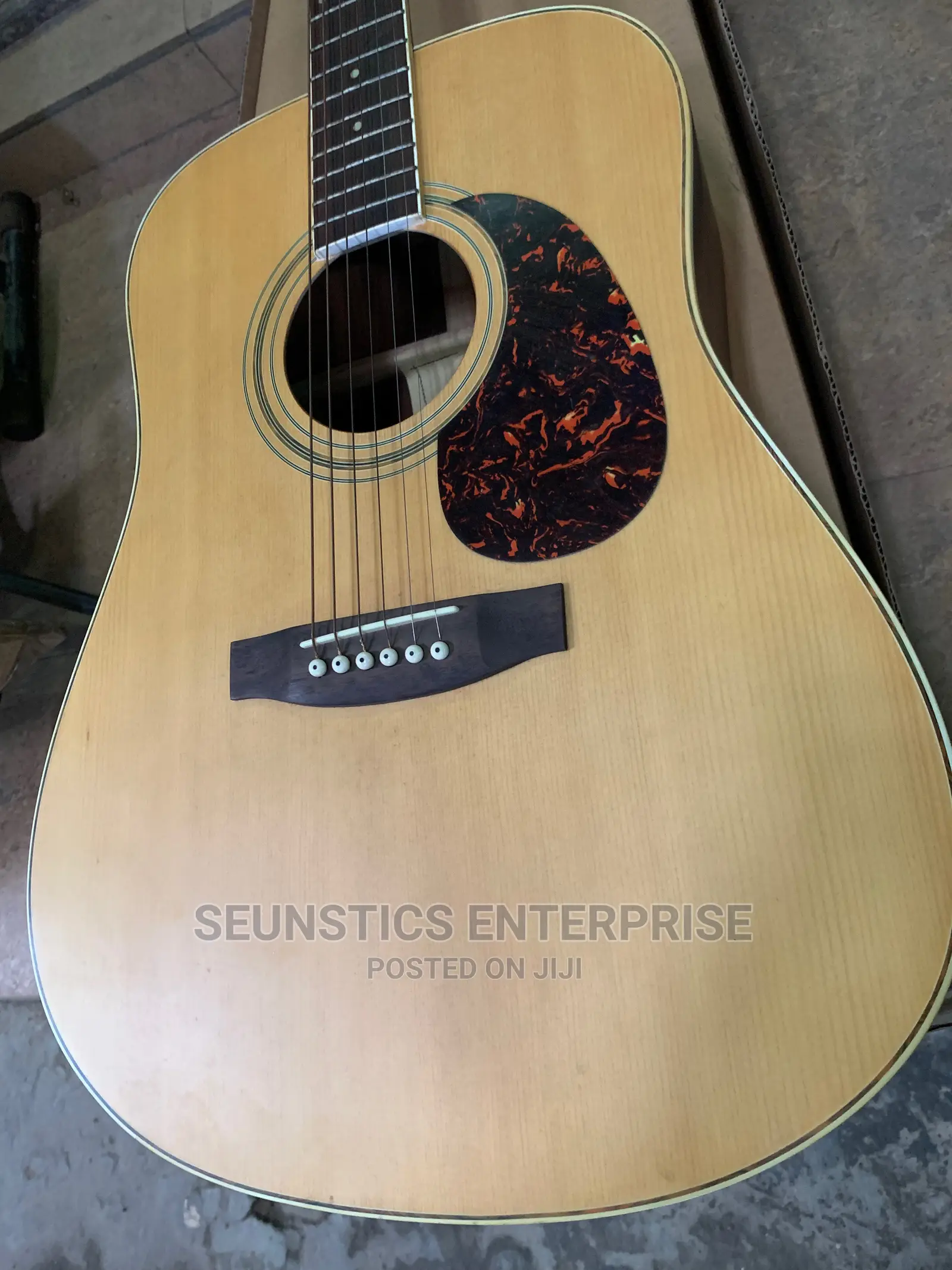 Quality O- Bong Acoustic Guitar