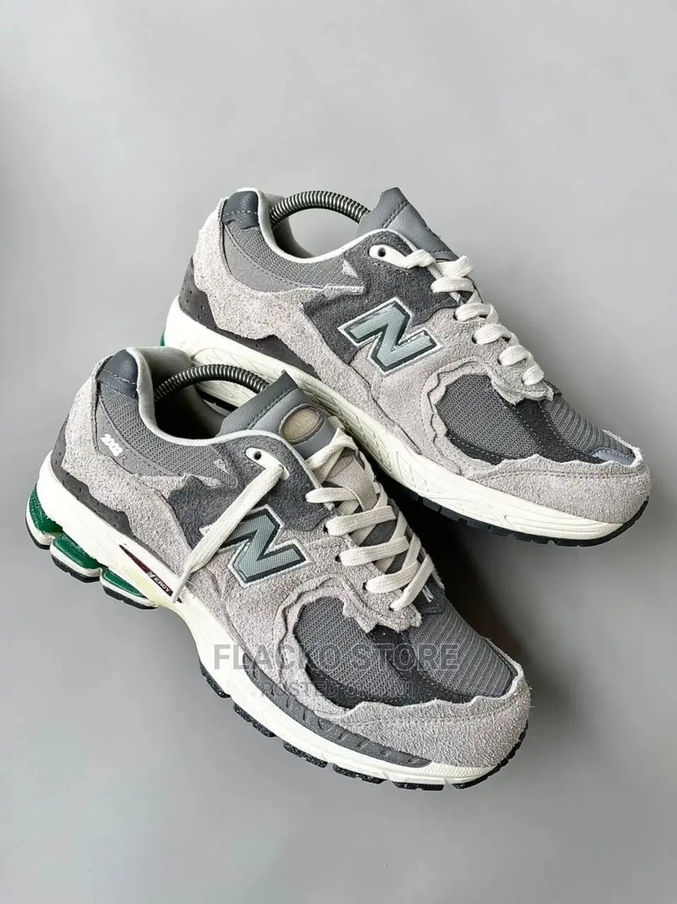 Original New Balance 2002R Protection Pack Sneaker Available