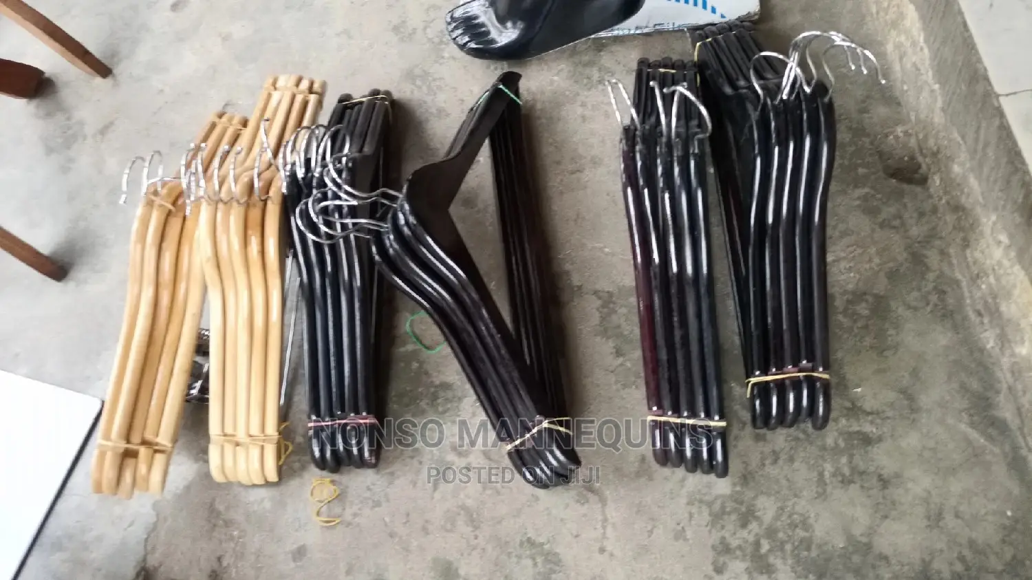 Black Color and Brown Wooden Clothes Hangers