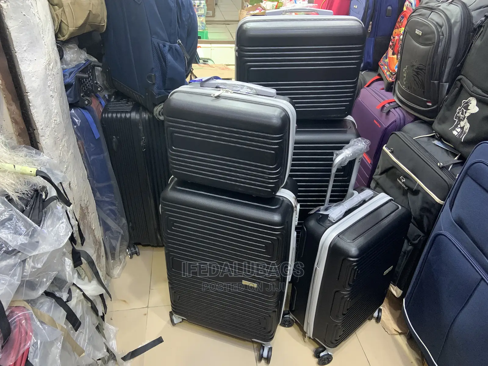 Set of Black Imported Plastic Traveling Luggage With Big Kit