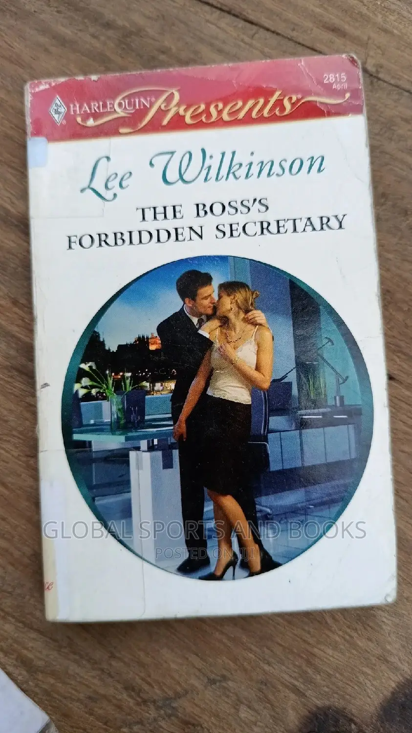 Harlequin Present Red and White Romance Novel