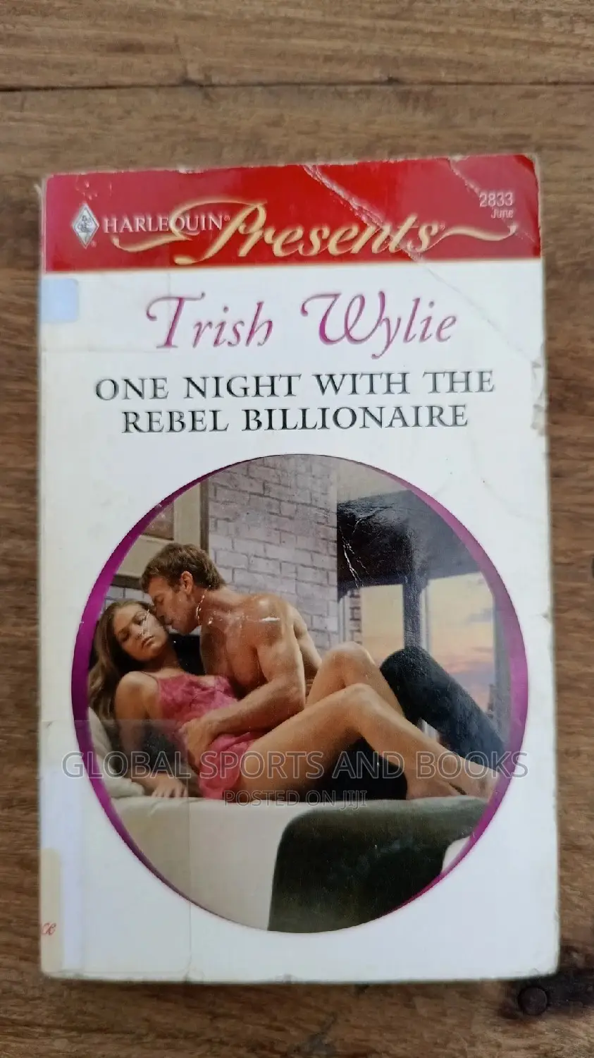 Harlequin Present Red and White Romance Novel