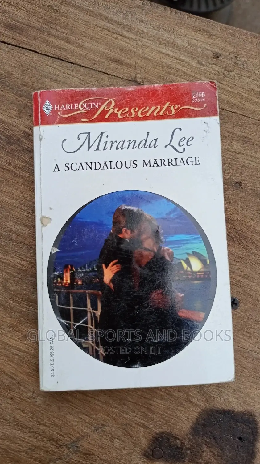Harlequin Present Red and White Romance Novel