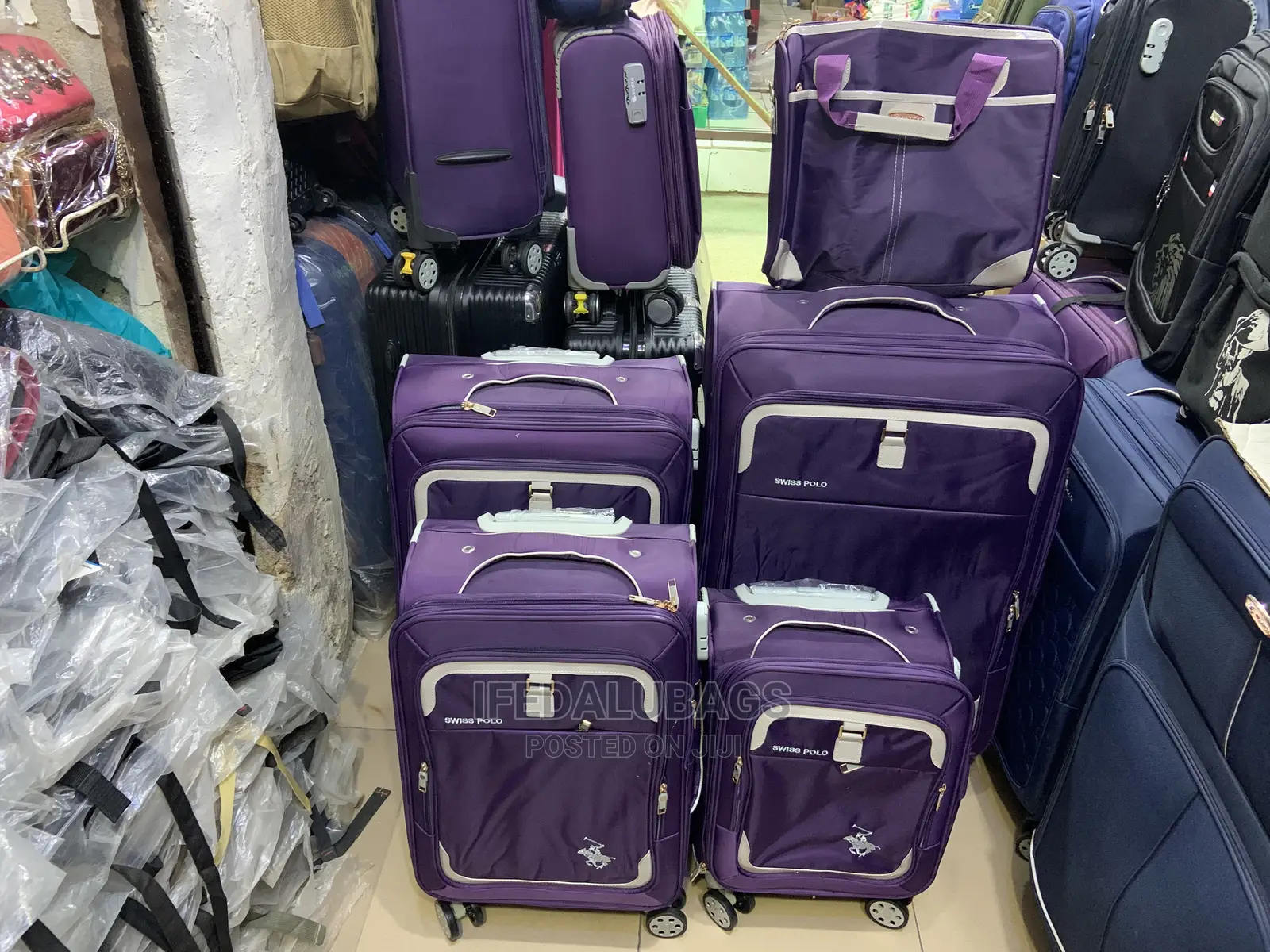 Set of Purple Swiss Polo Traveling Luggage