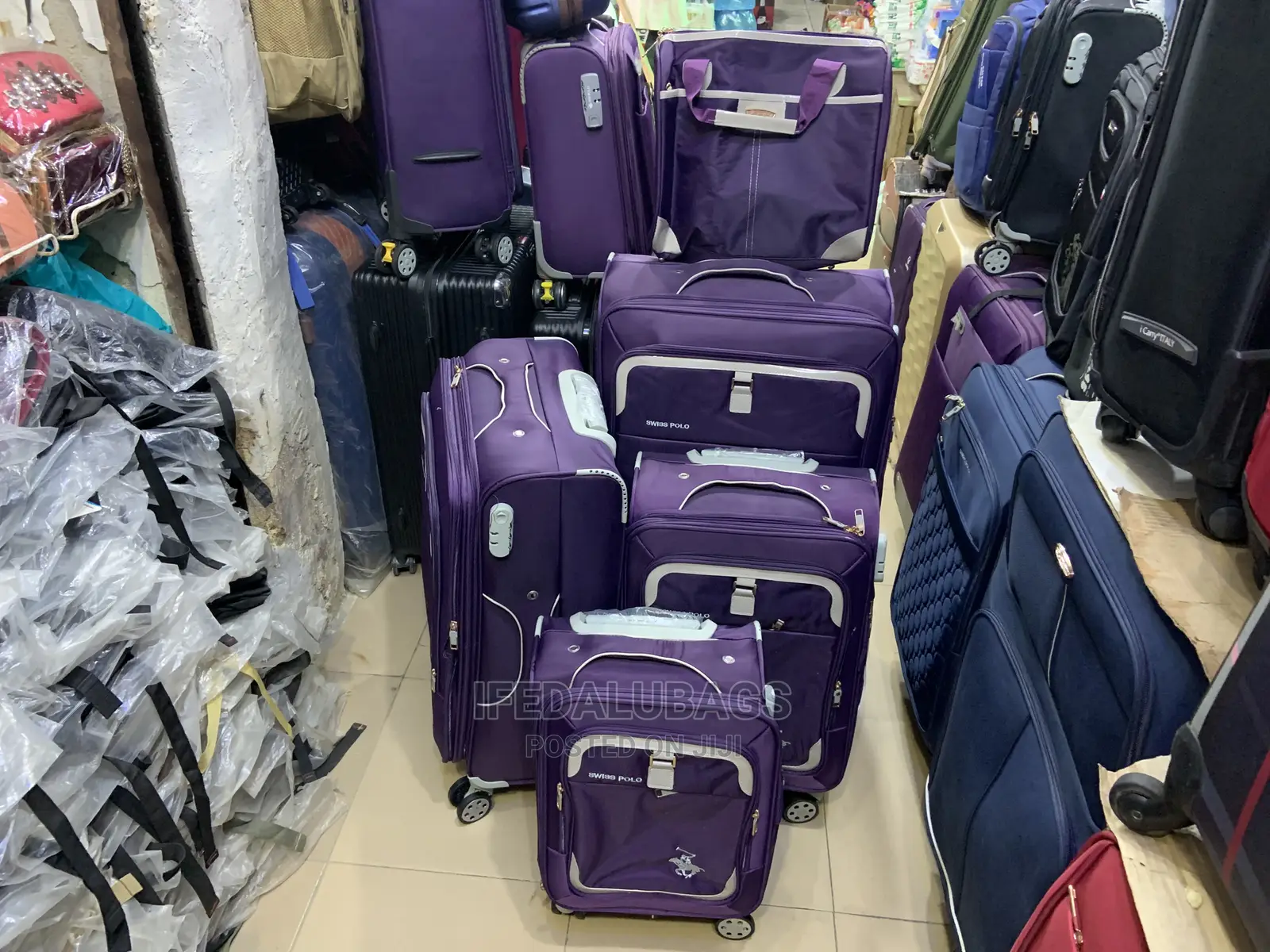 Set of Purple Swiss Polo Traveling Luggage