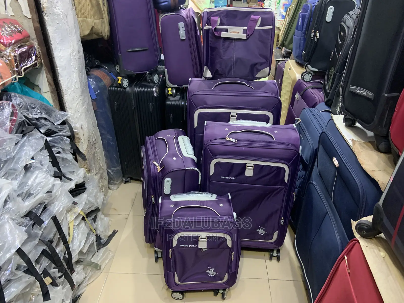 Set of Purple Swiss Polo Traveling Luggage