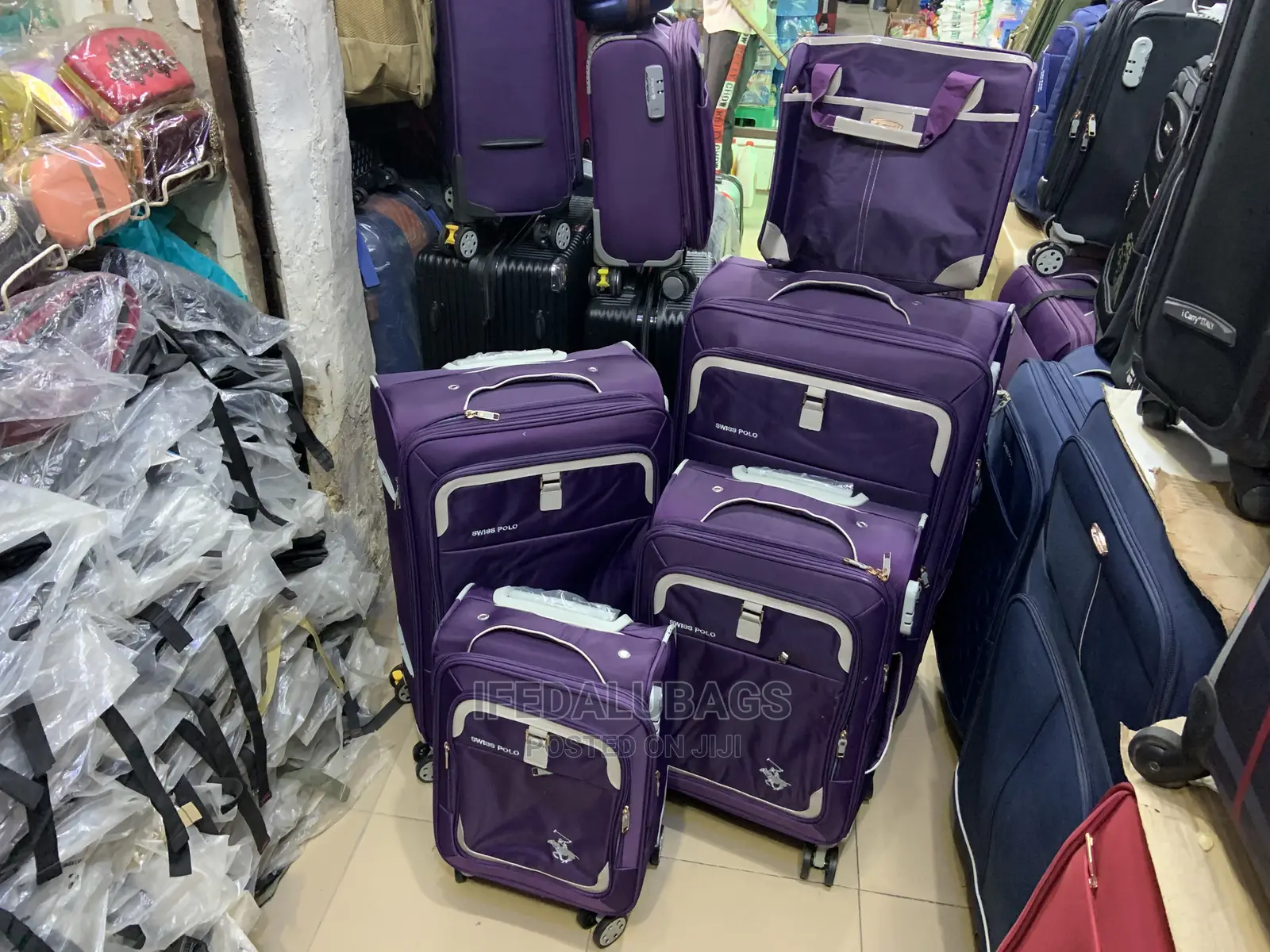 Set of Purple Swiss Polo Traveling Luggage