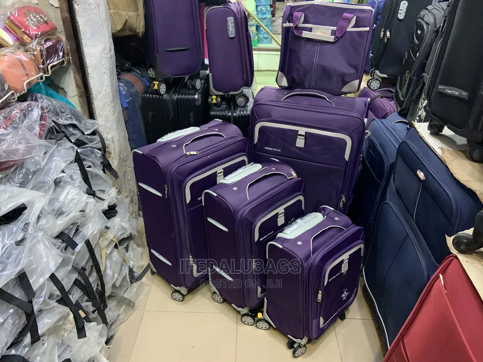 Set of Purple Swiss Polo Traveling Luggage
