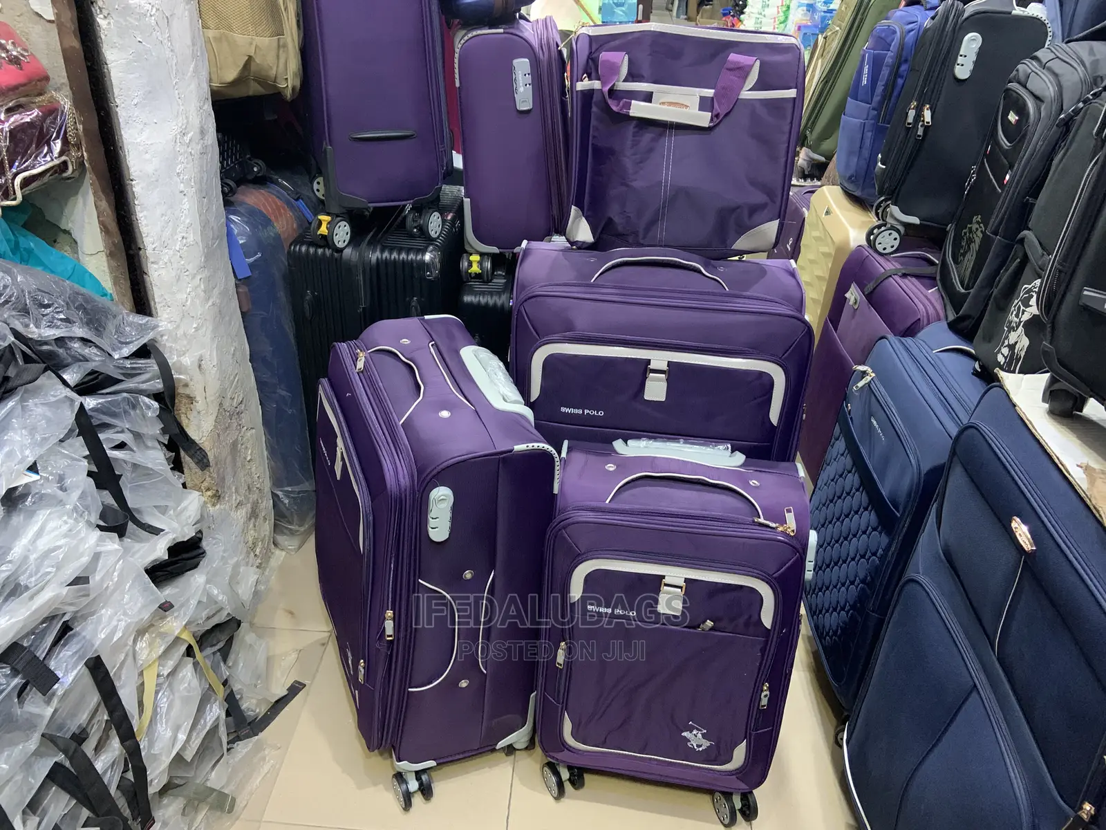 Set of 4 Purple Swiss Polo Traveling Luggage
