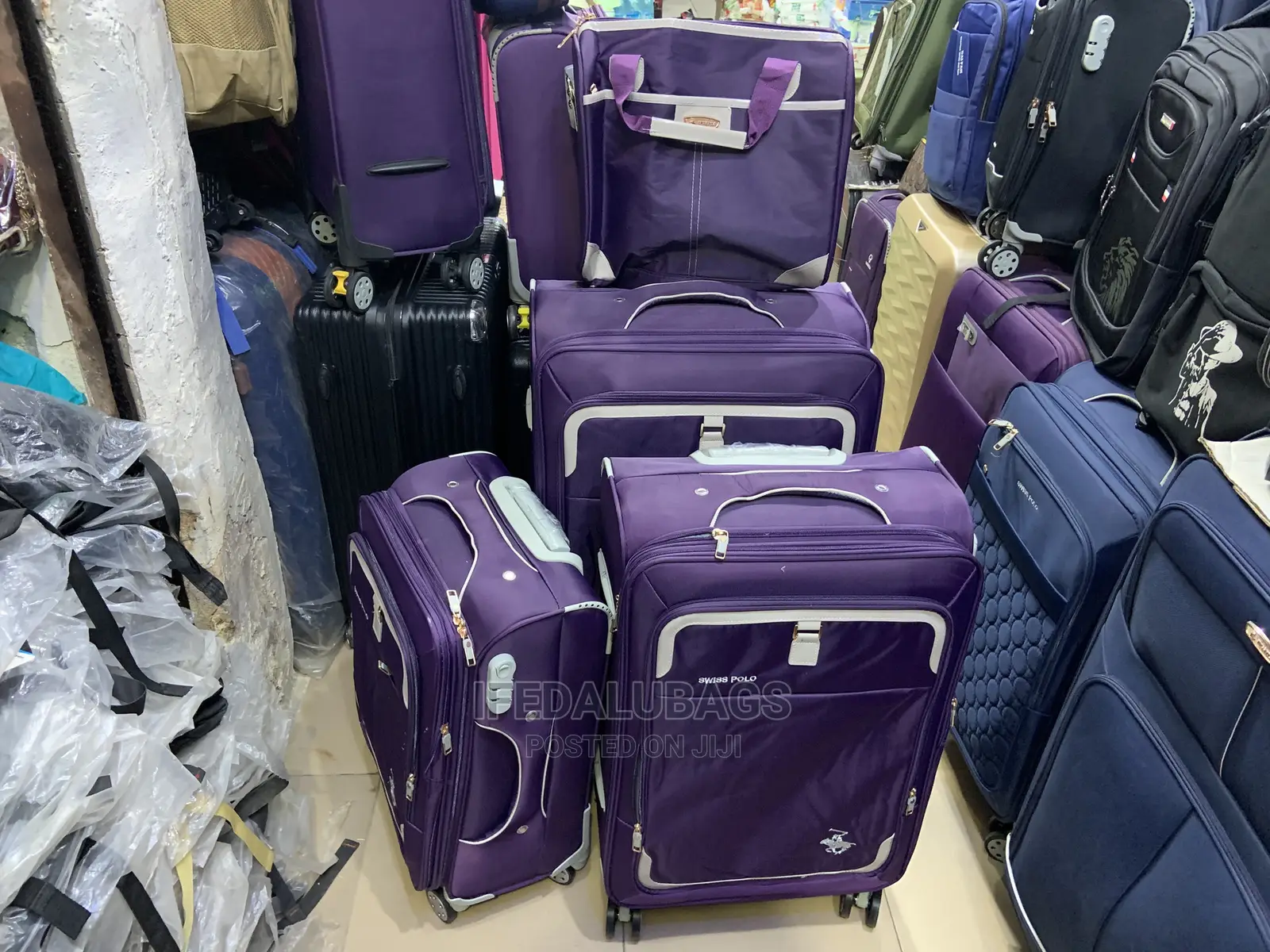 Set of 4 Purple Swiss Polo Traveling Luggage