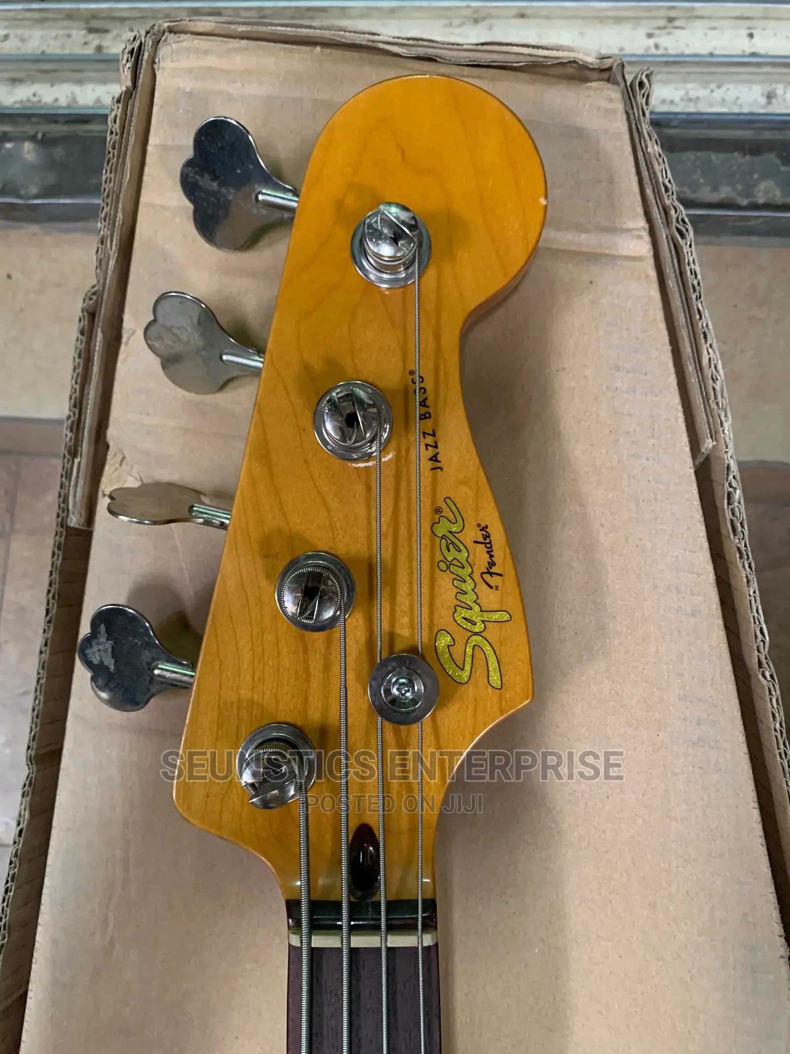 Quality Four String Squier by Fender Jazz Bass Guitar