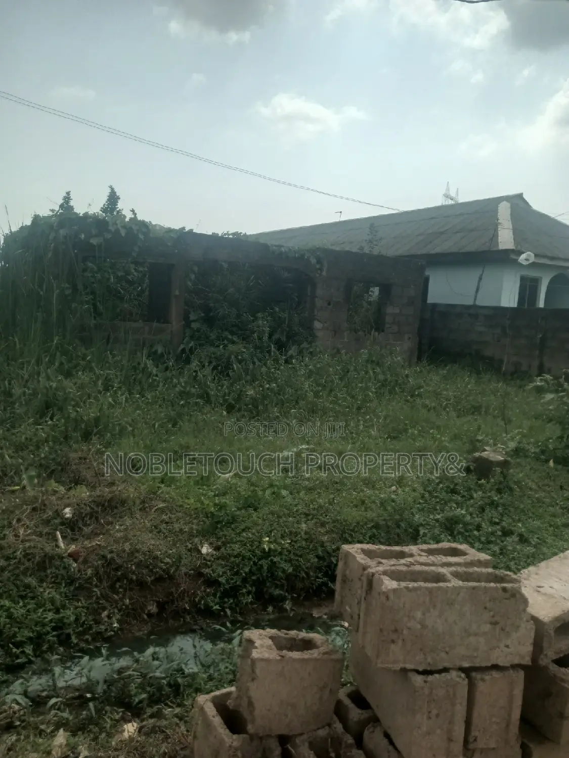 Half Plot of Land at Council Idimu for Sale