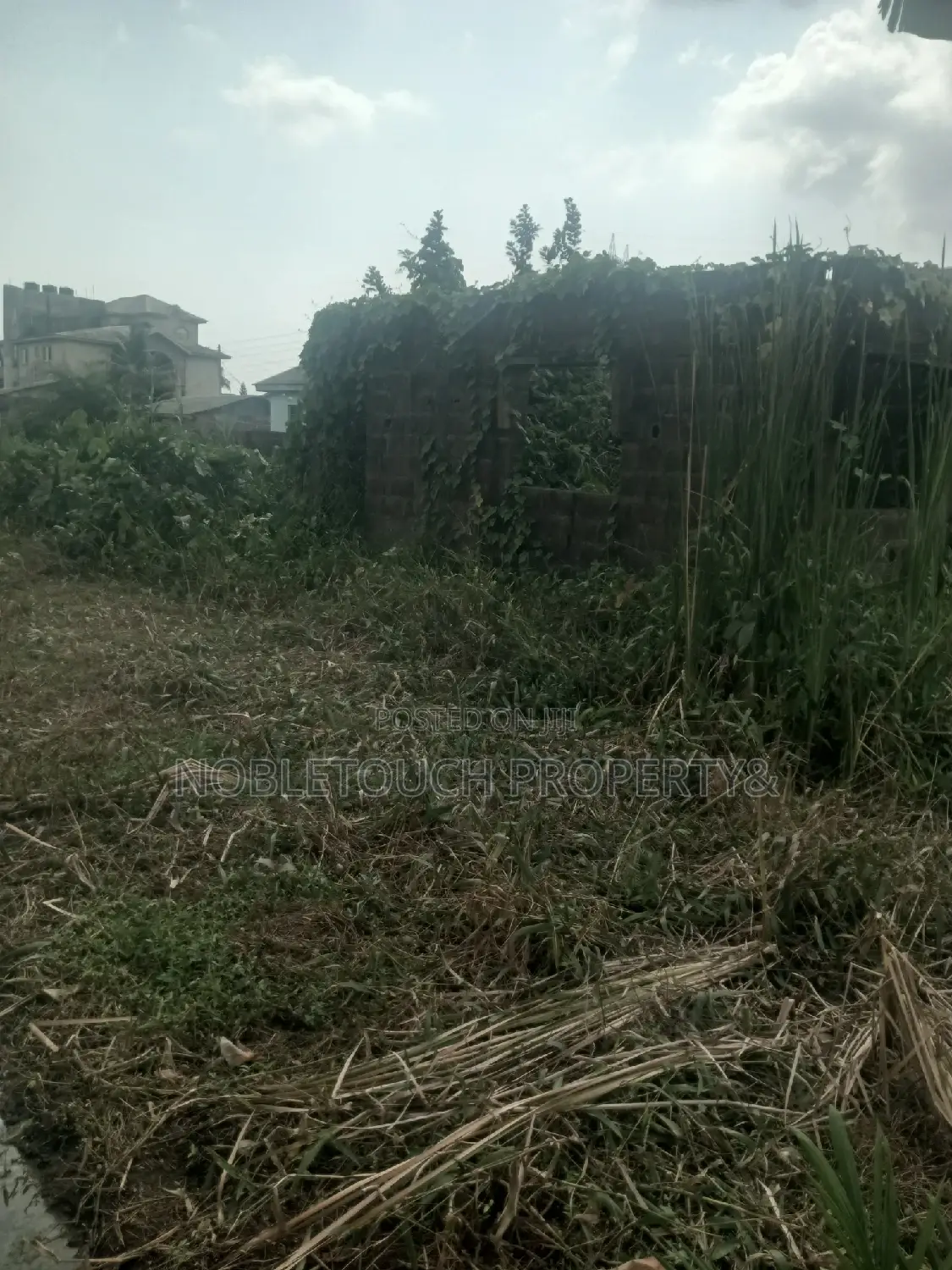 Half Plot of Land at Council Idimu for Sale