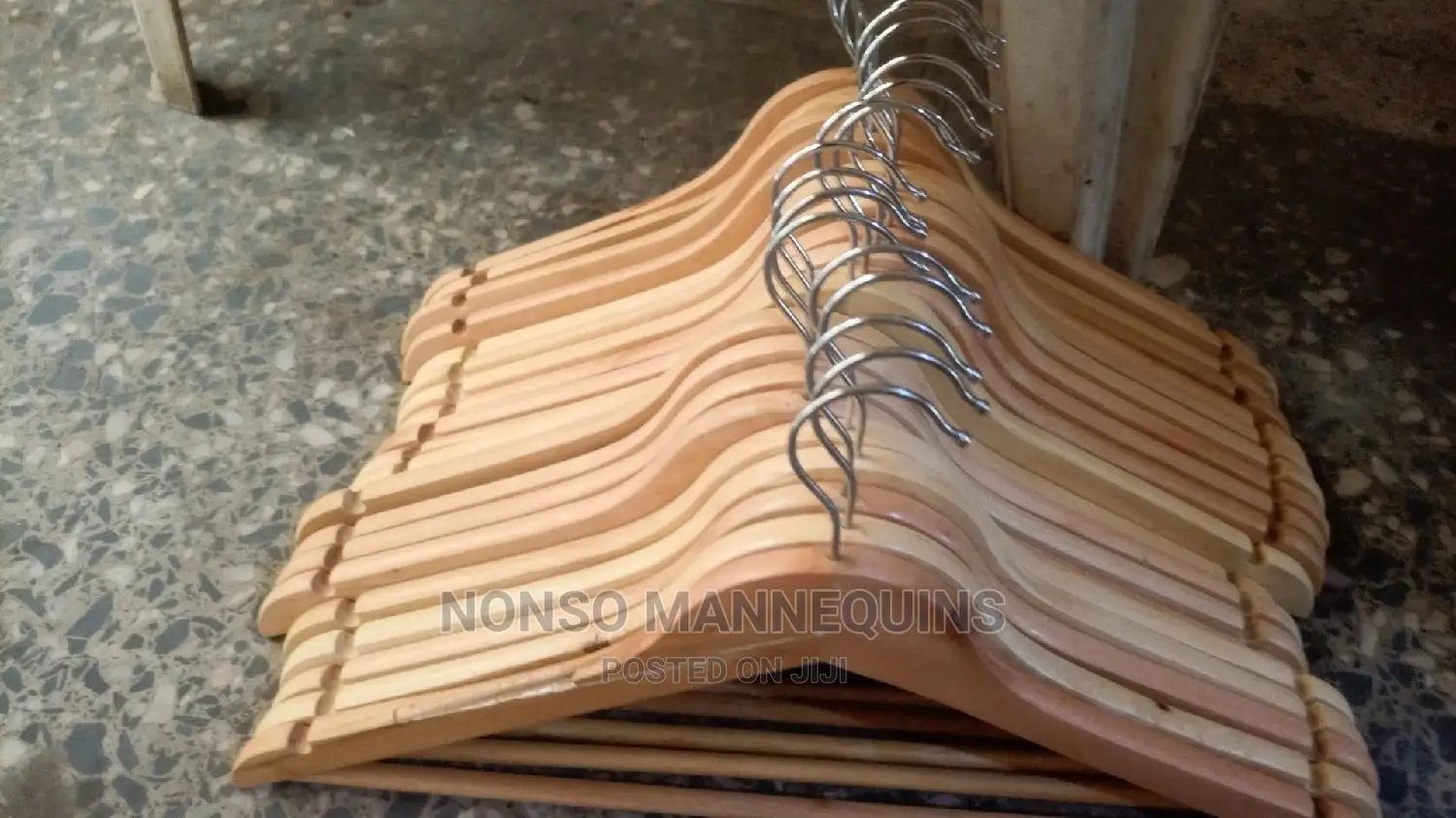 Clean And Neat Seta Of Wooden Clothes Hangers