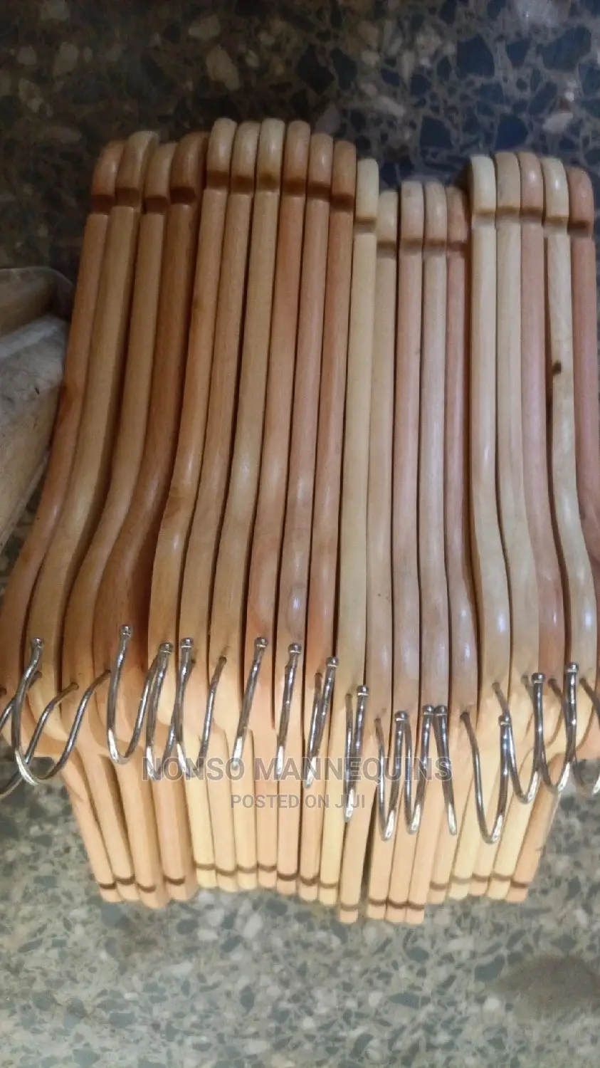 Clean And Neat Seta Of Wooden Clothes Hangers