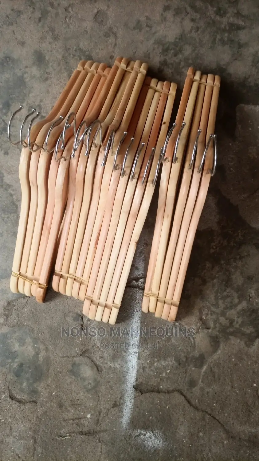 Clean And Neat Seta Of Wooden Clothes Hangers