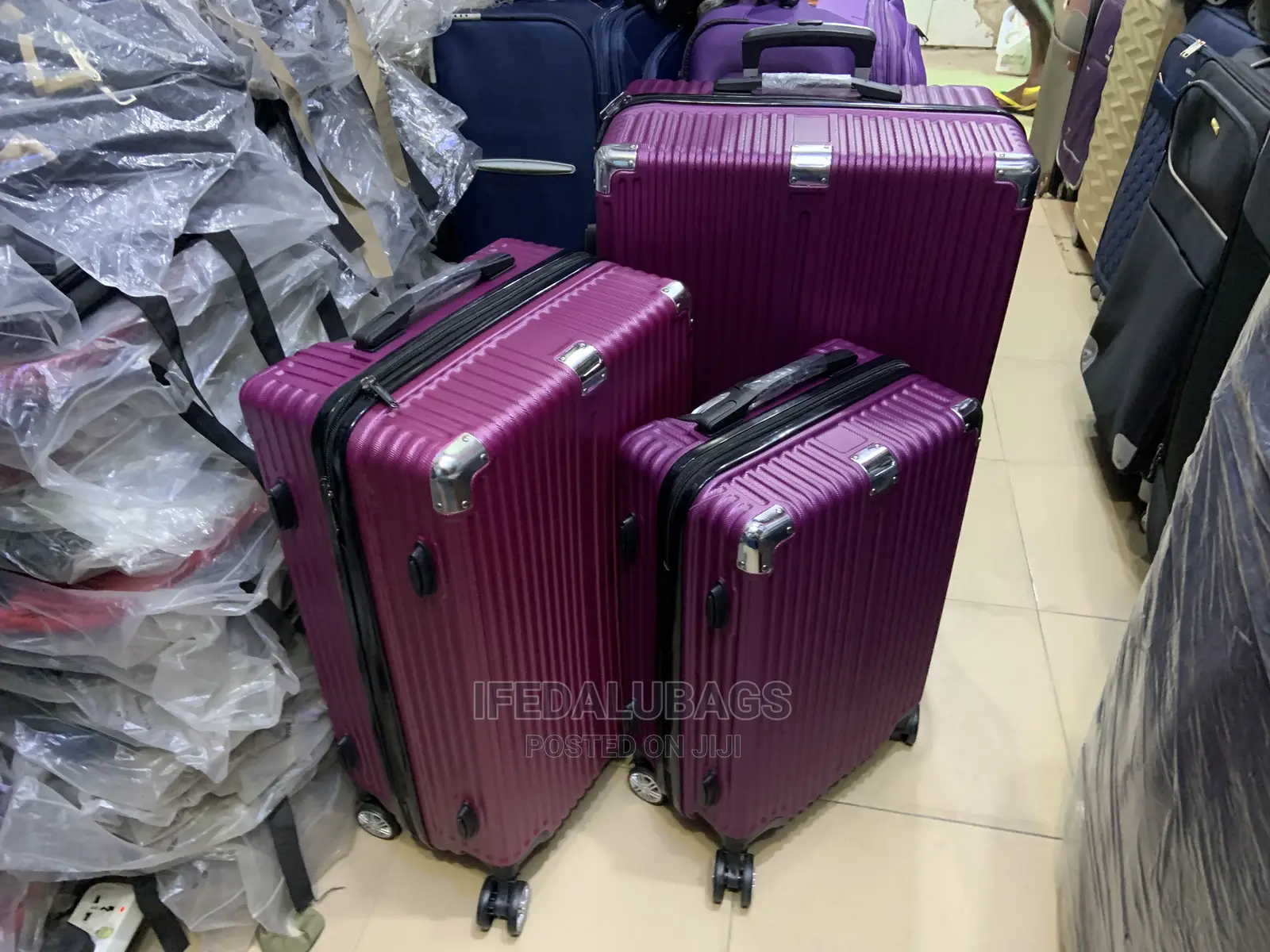 Set of Purple Durable Plastic Traveling Luggage