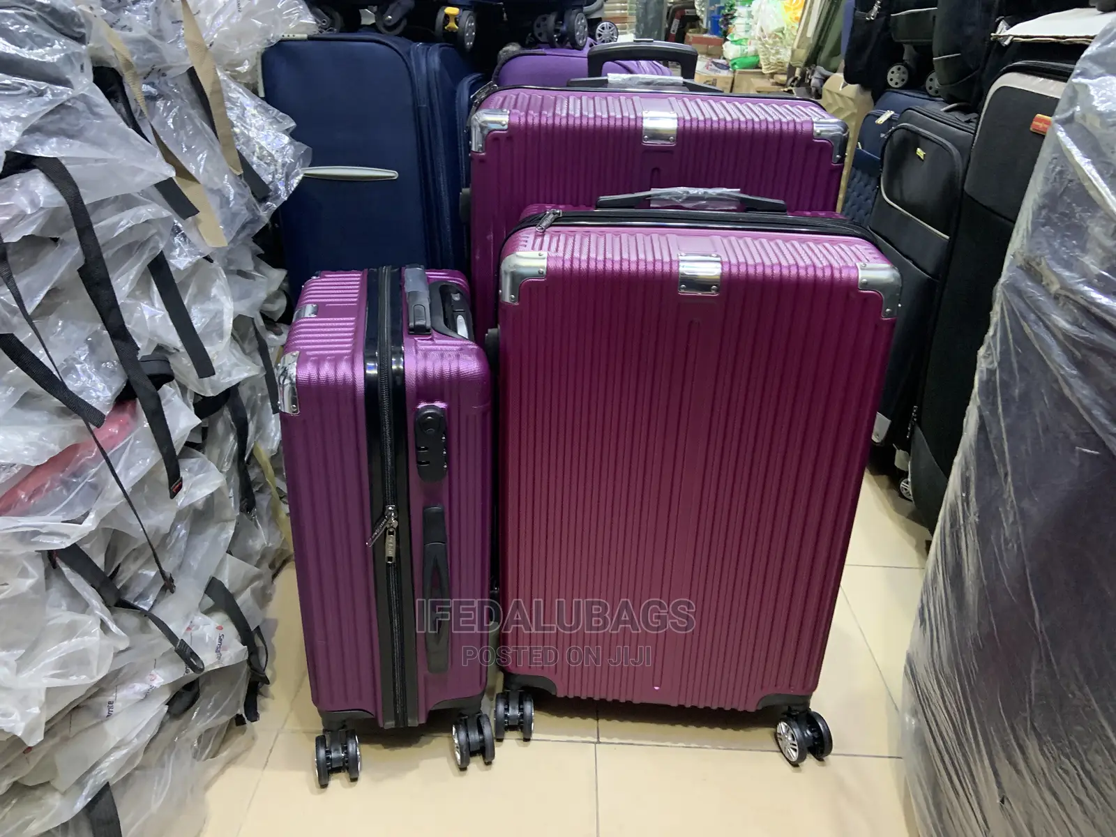 Set of Purple Durable Plastic Traveling Luggage