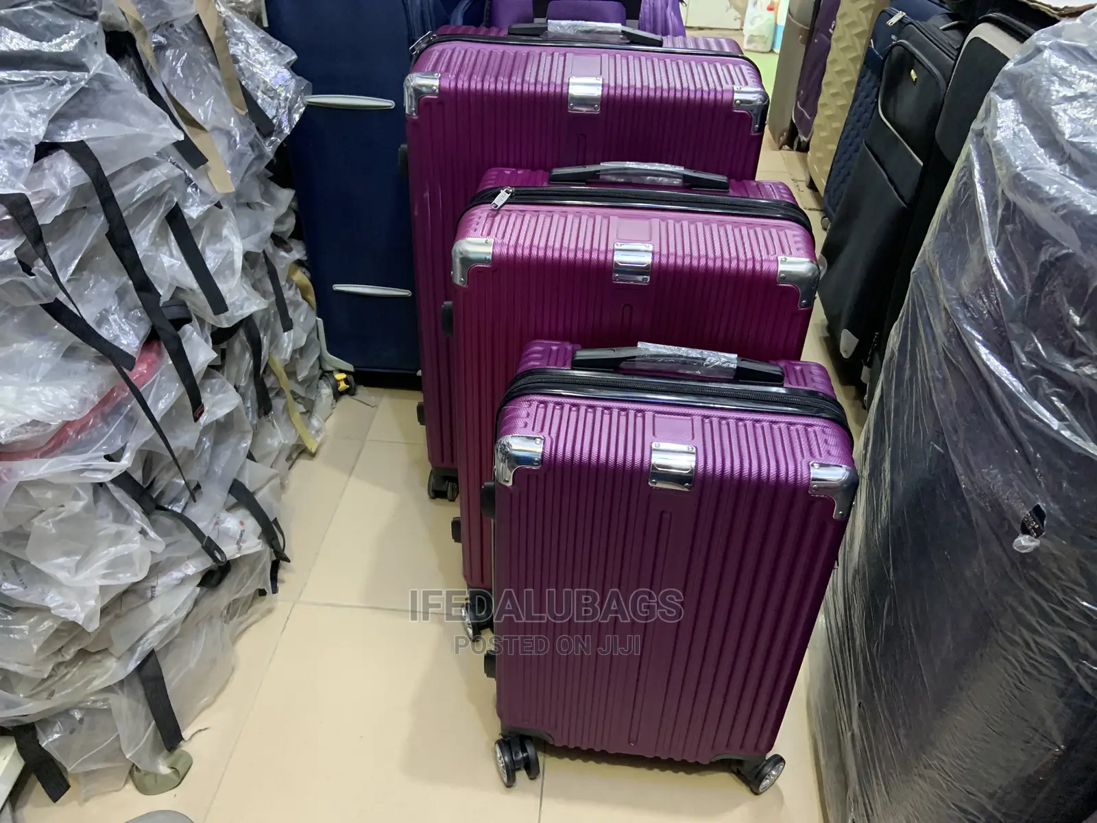 Set of Purple Durable Plastic Traveling Luggage