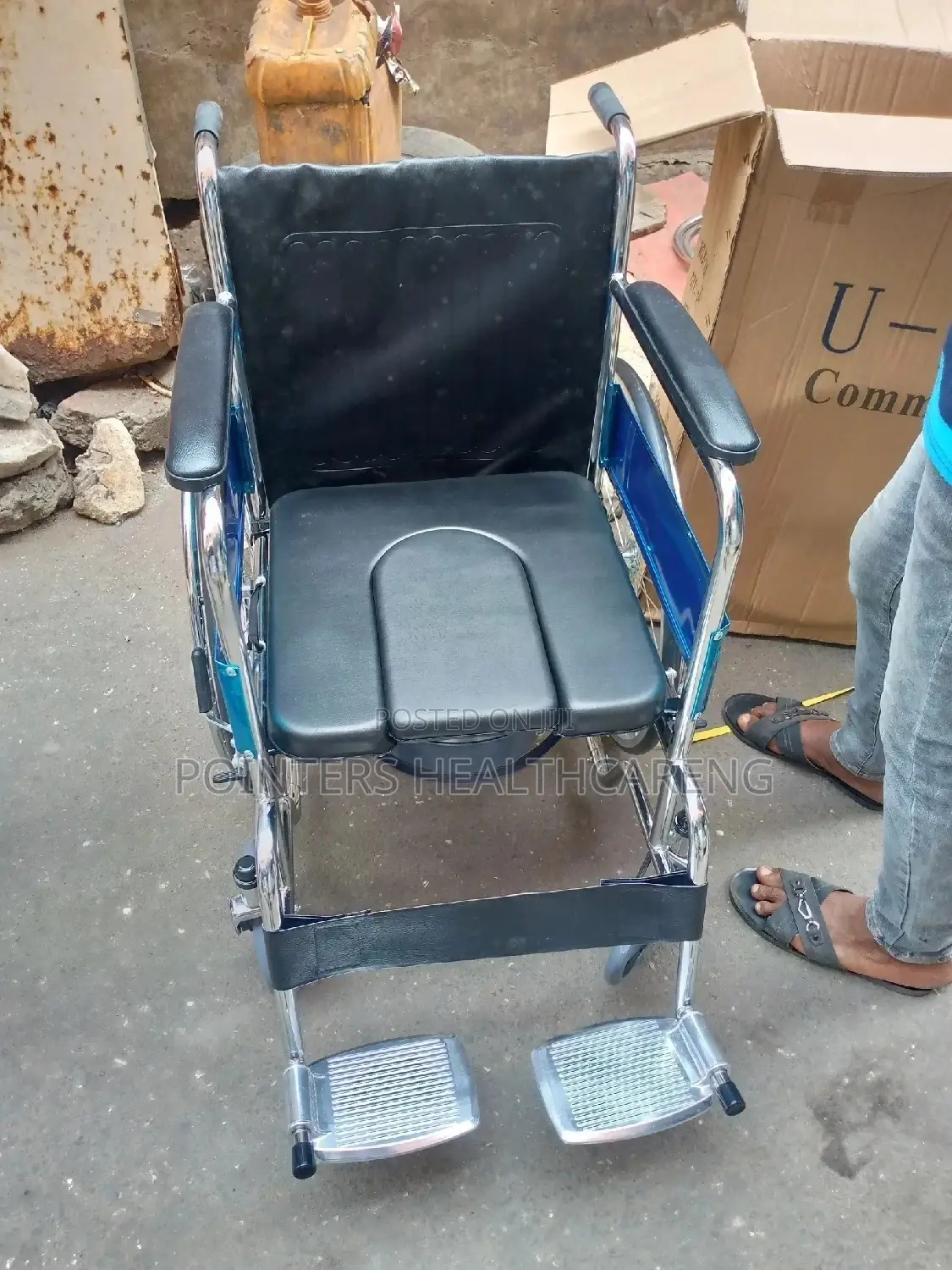 Wheelchair With Comode