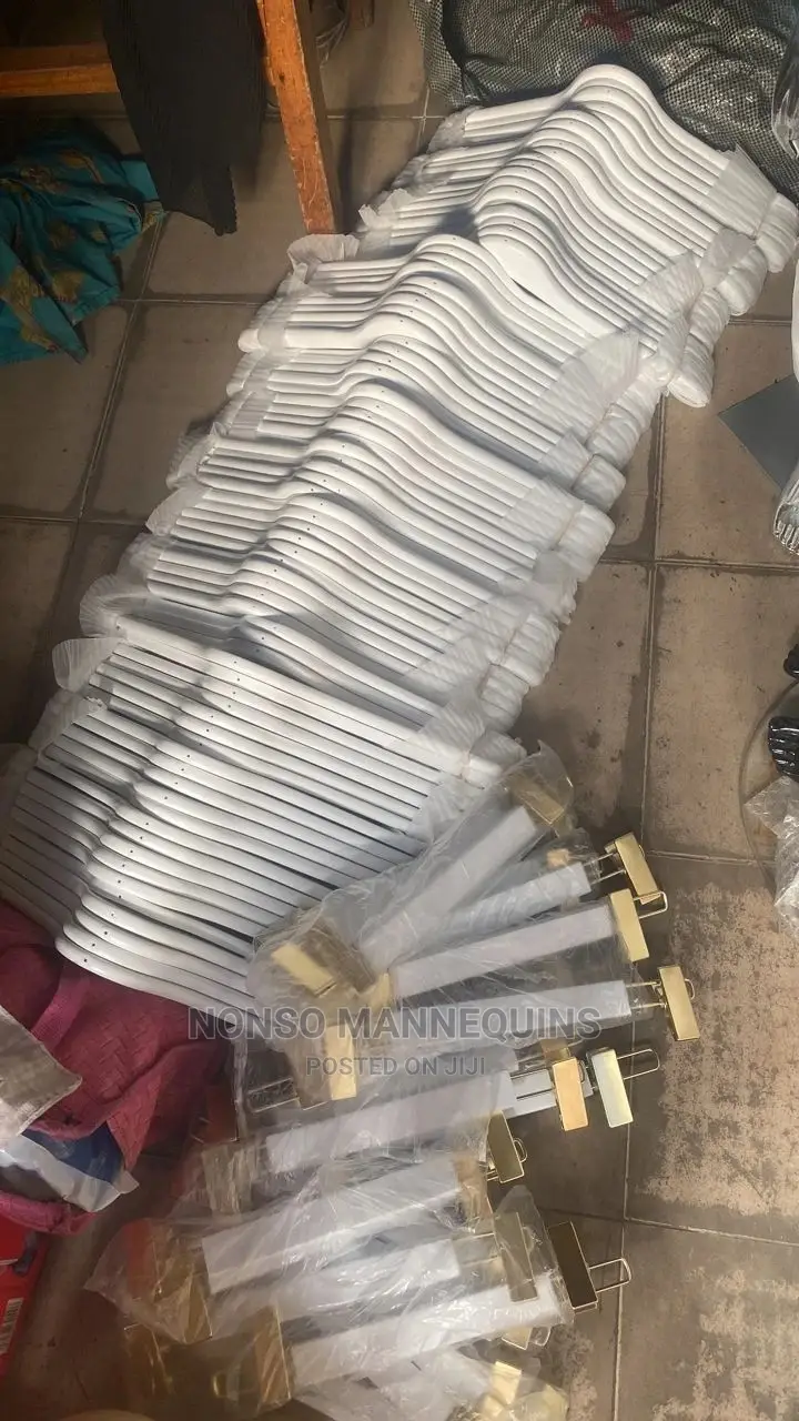 White Wooden Clothes Hangers With Gold Hooks