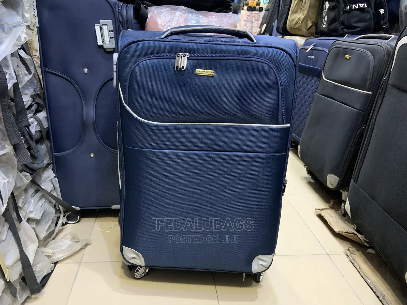 Medium Size Blue Traveling Luggage