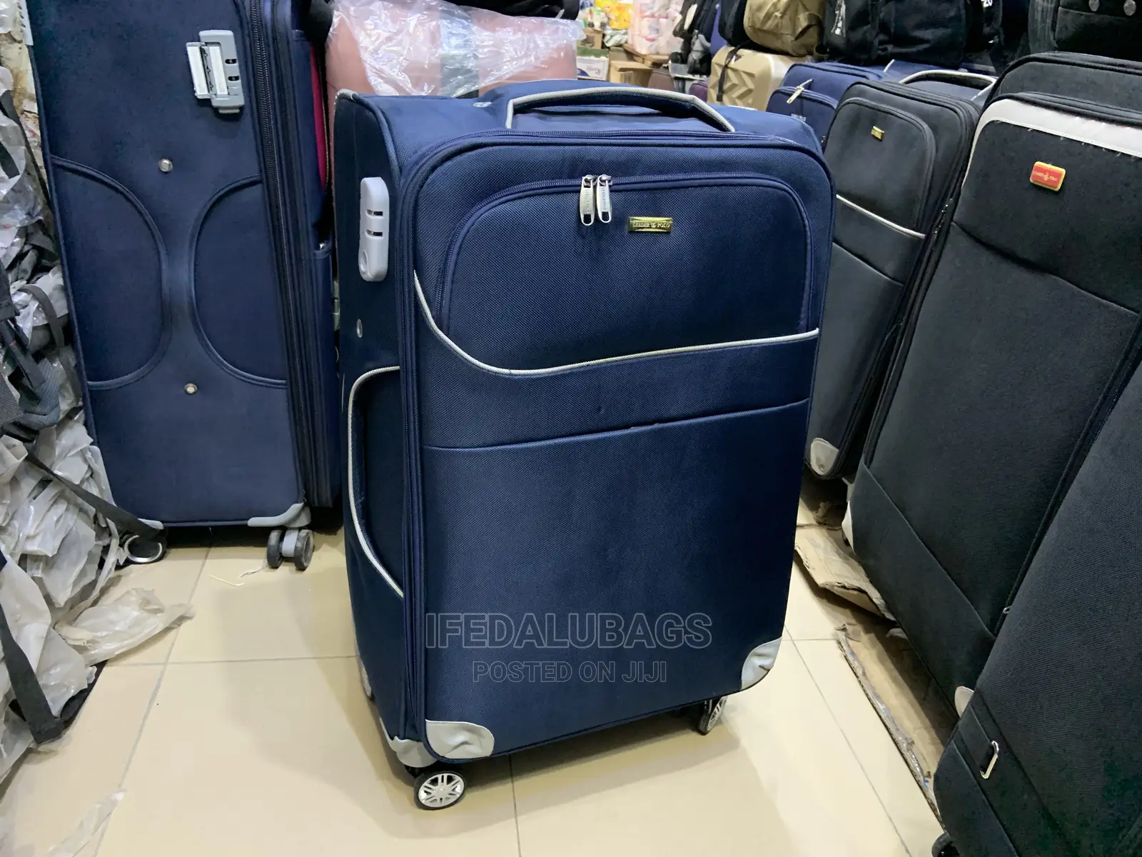 Medium Size Blue Traveling Luggage