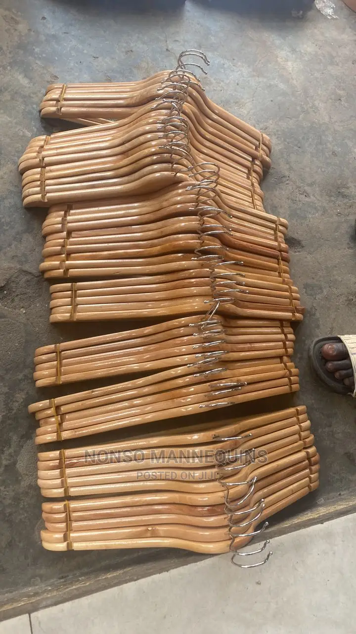 Bundles of Wooden Hangerz for Clothing Display