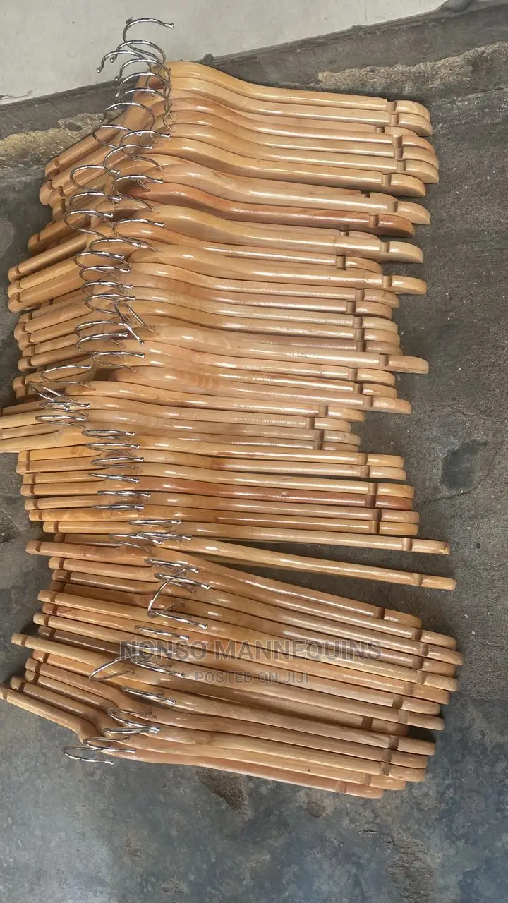 Bundles of Wooden Hangerz for Clothing Display