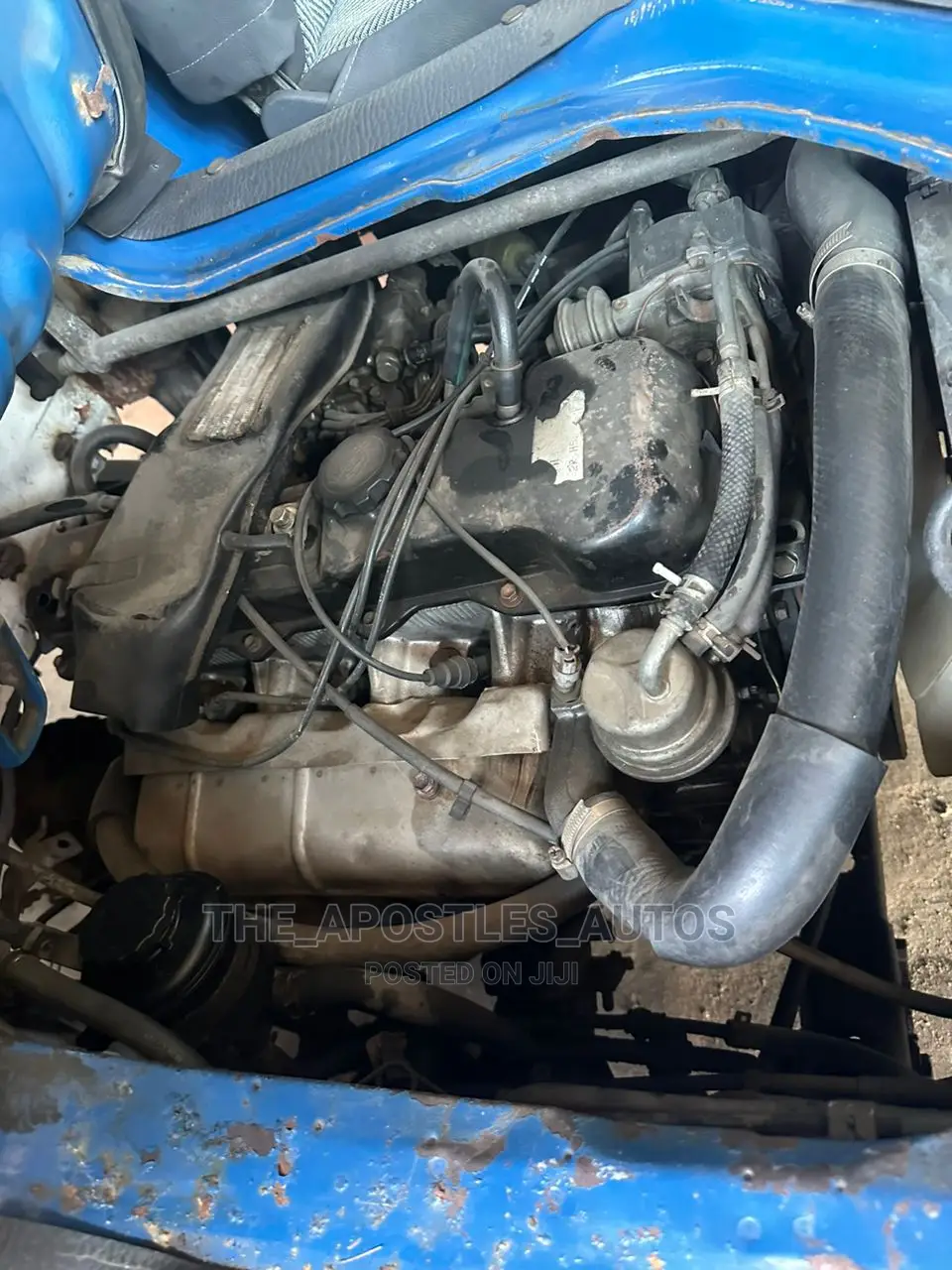 Blue Toyota Dyna 100 (Direct Hand)