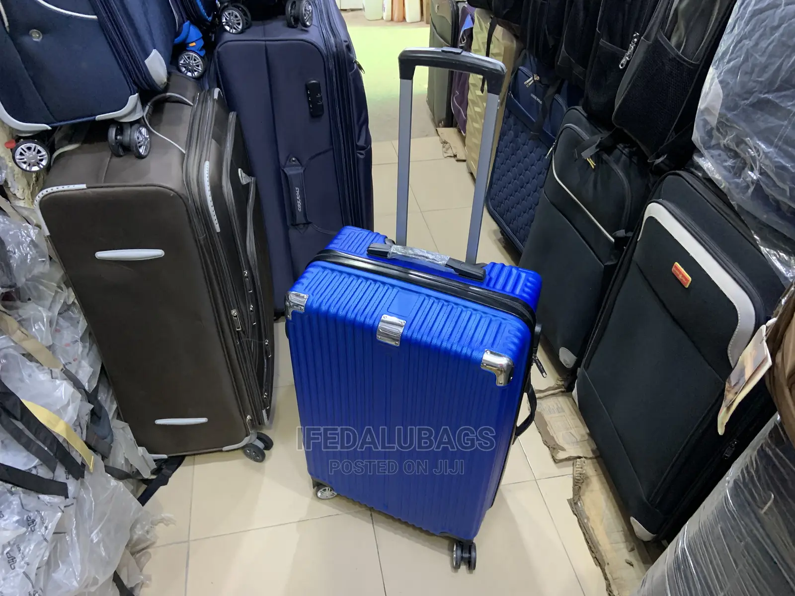Medium Size Blue Quality Plastic Traveling Luggage