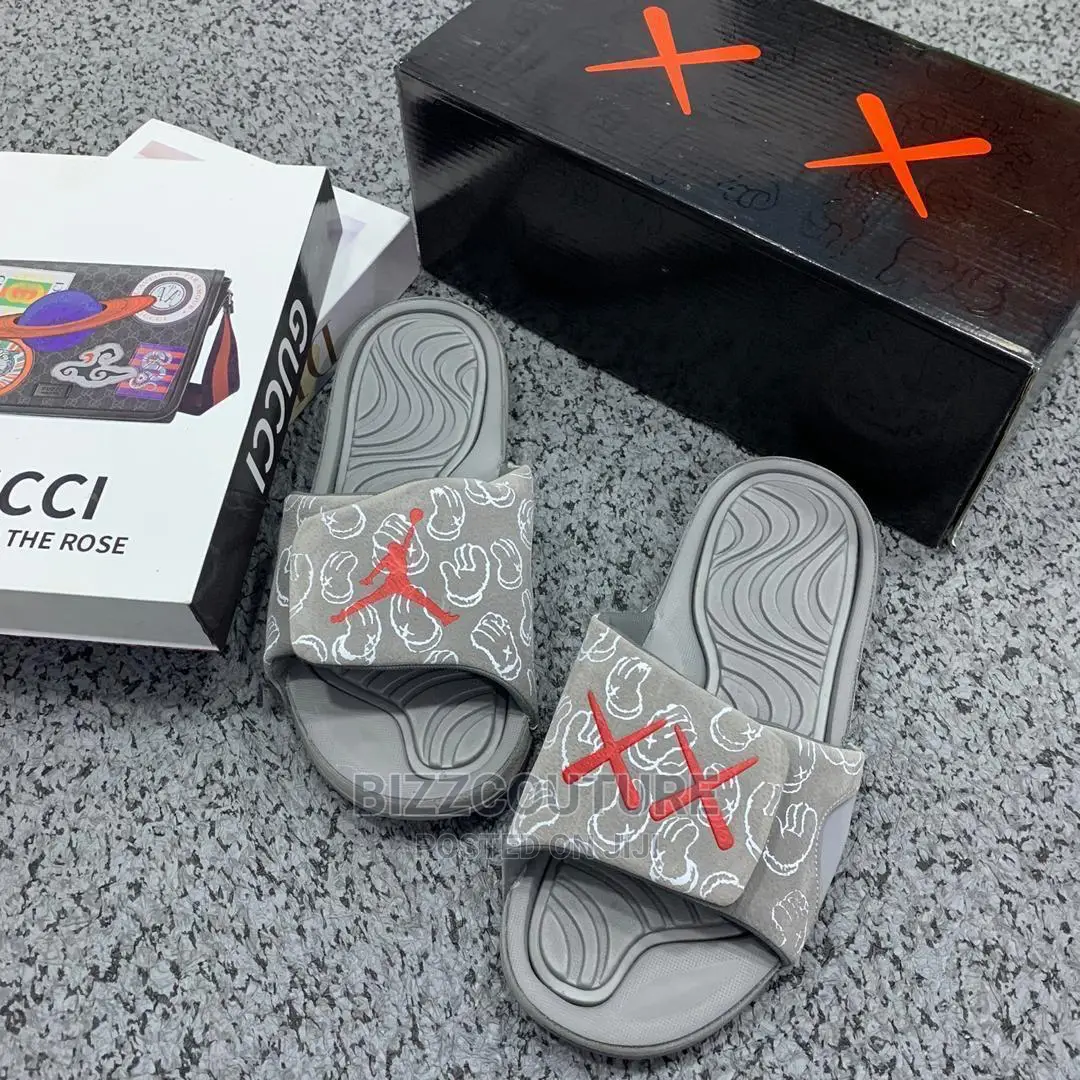 Original KAWS X JORDAN Retro Slides Available in Store