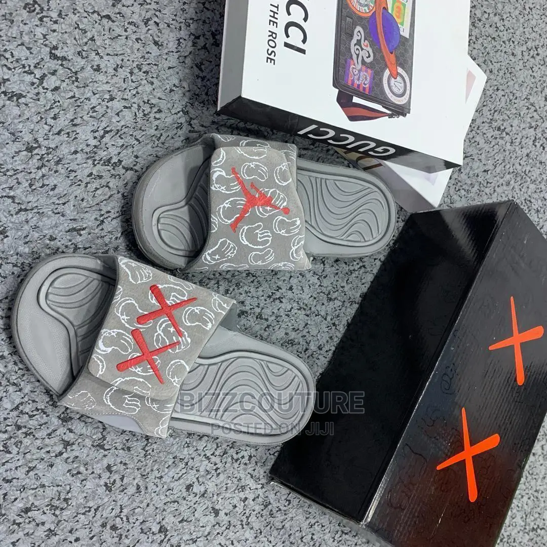 Original KAWS X JORDAN Retro Slides Available in Store