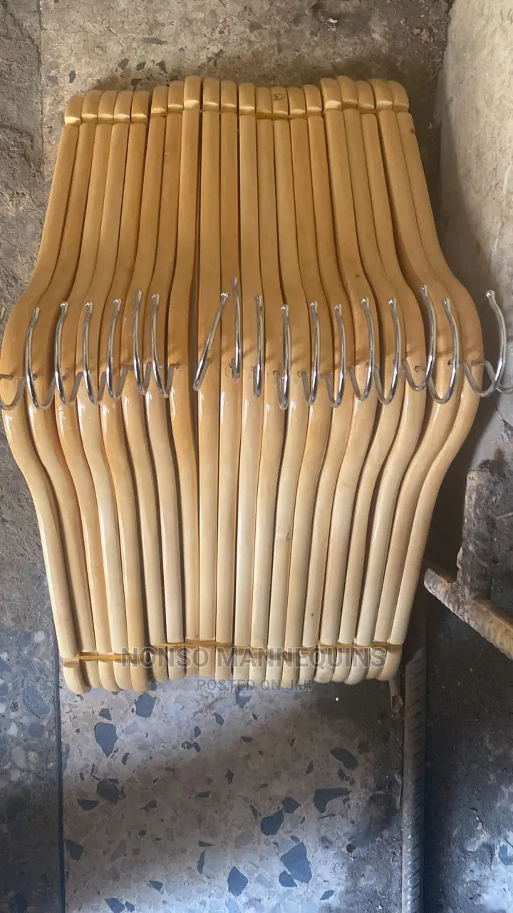 Bundles Of Wooden Hangers For Clothes Display