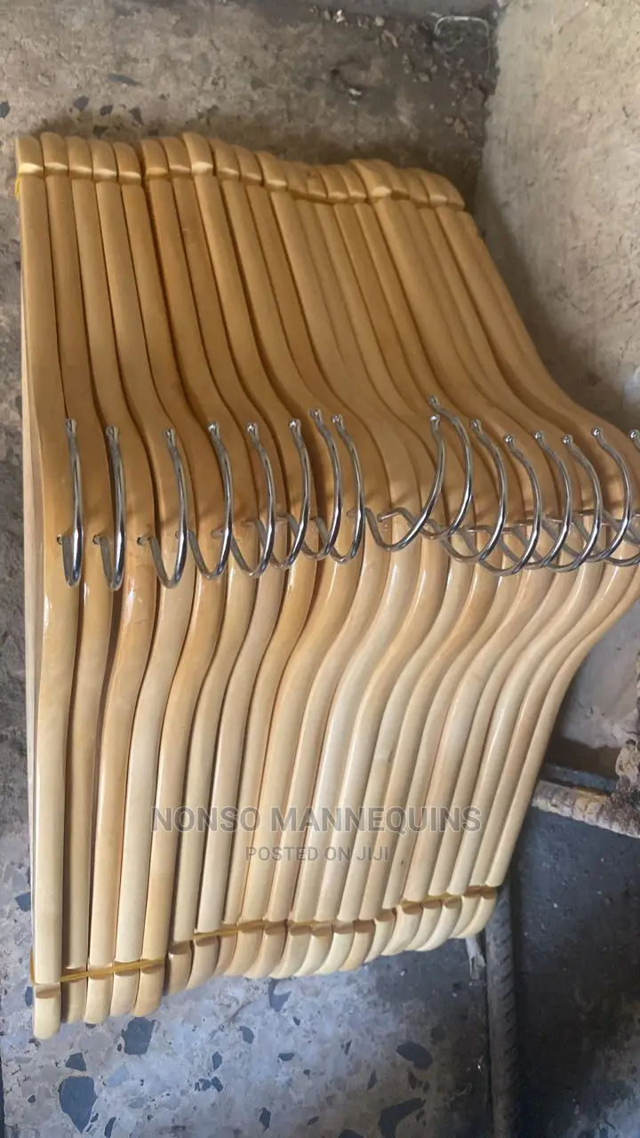Bundles Of Wooden Hangers For Clothes Display