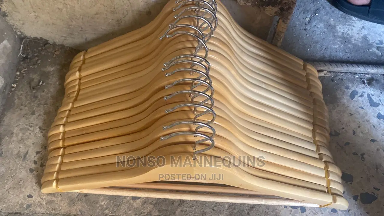 Bundles Of Wooden Hangers For Clothes Display