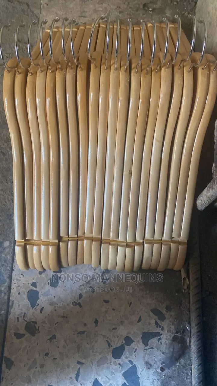 Bundles Of Wooden Hangers For Clothes Display