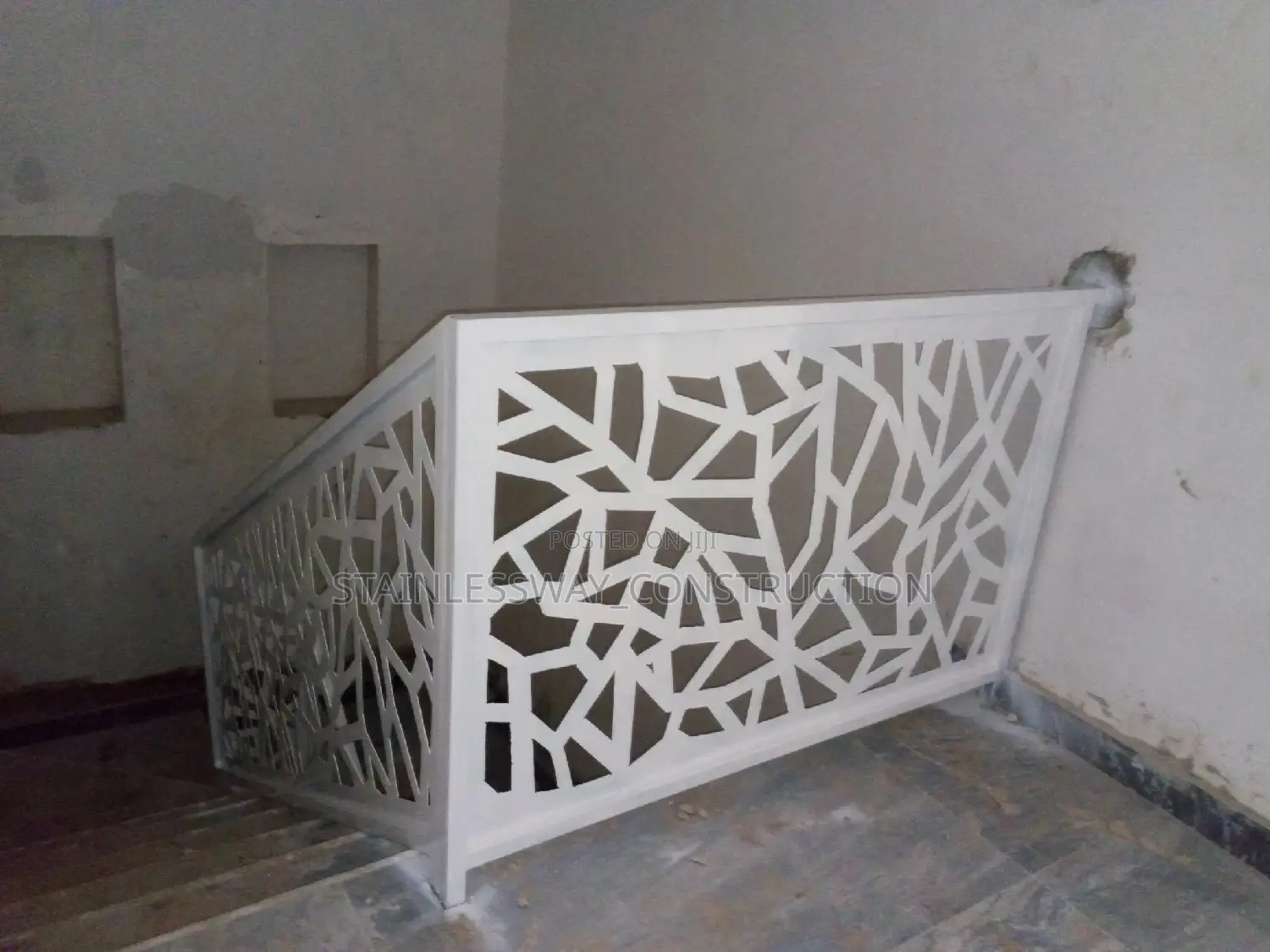 White Laser-Cut Designs for Staircase