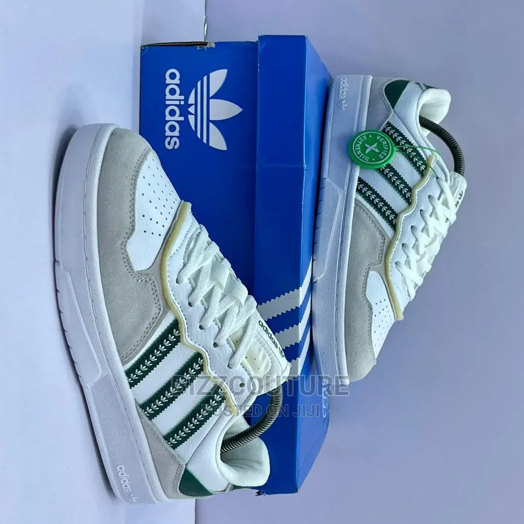 Original ADIDAS Tyshawn Low Sneakers Available in Store