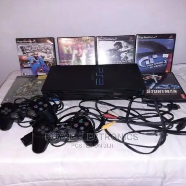 Authentic Uk Used PS2 With Pes23 + 10 Games and Pad