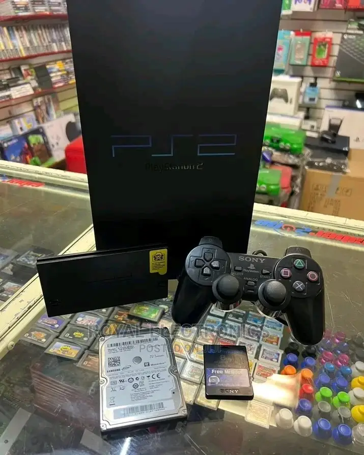 Quality Uk Used Ps2 With Pes23 + 10 Games And Pad