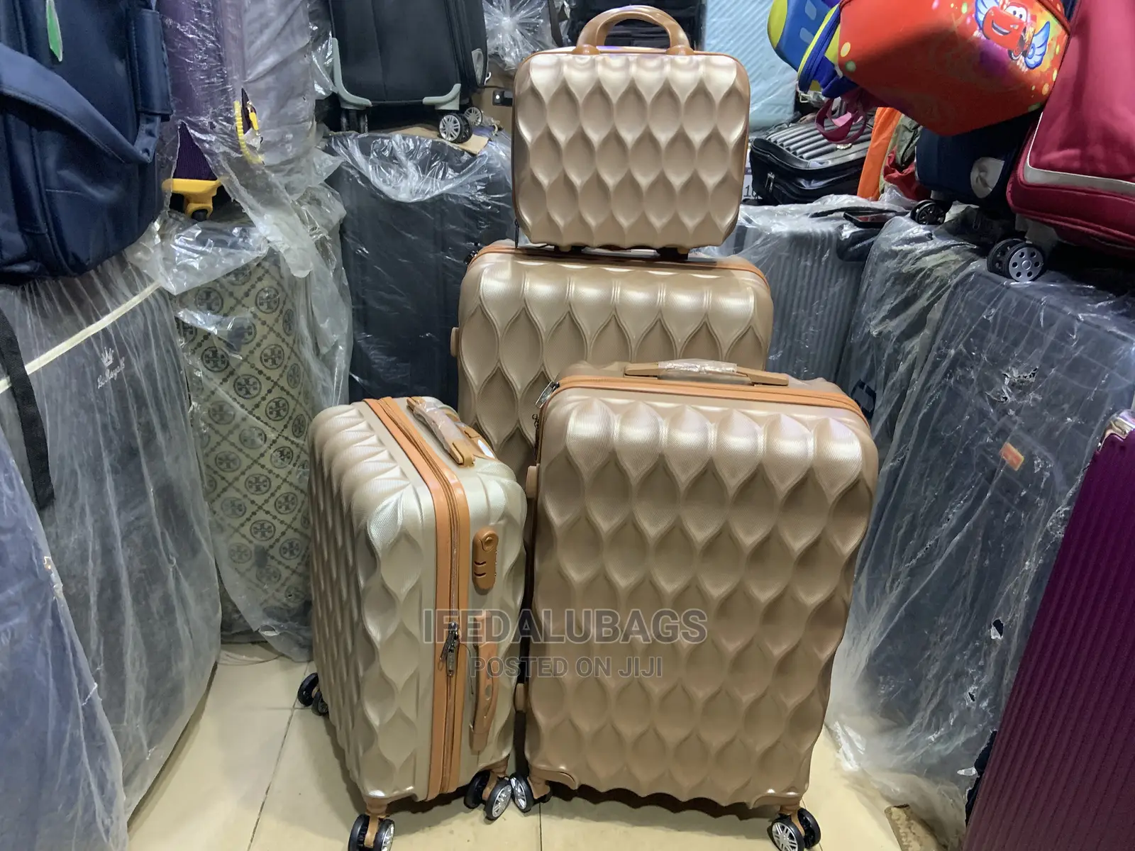 Set of Gold Color Quality Plastic Traveling Luggage With Kit