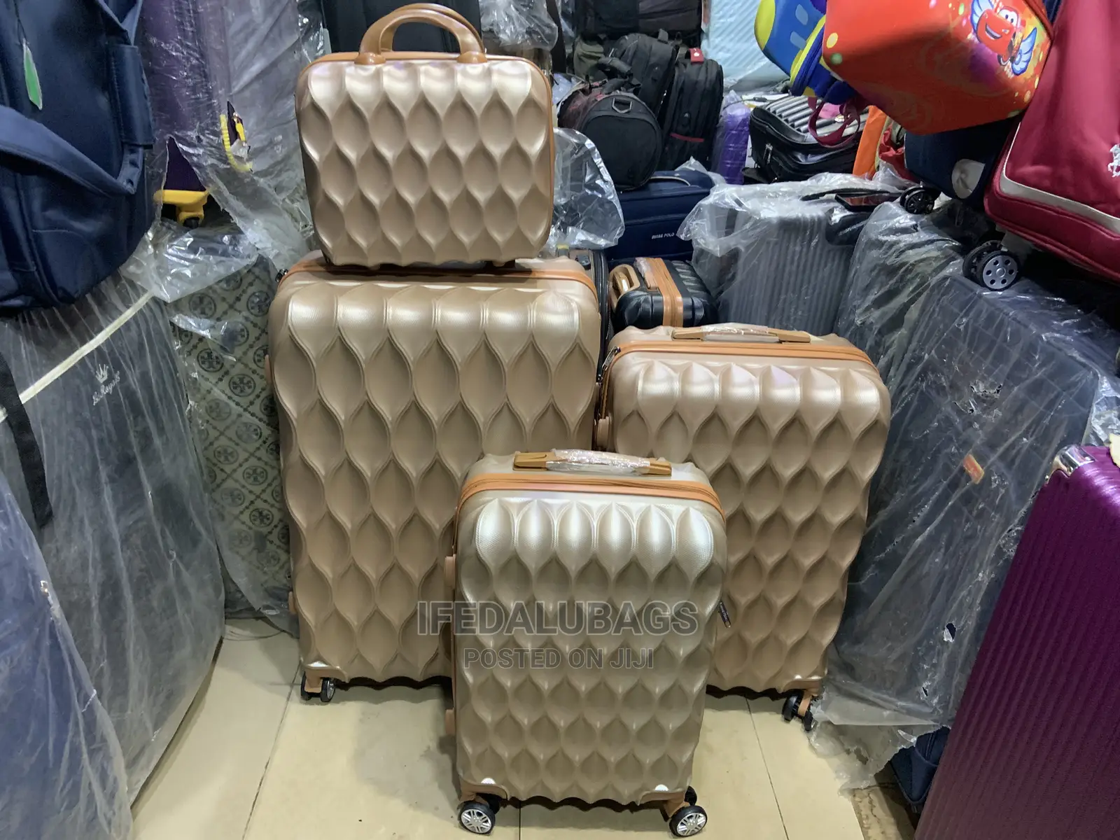 Set of Gold Color Quality Plastic Traveling Luggage With Kit