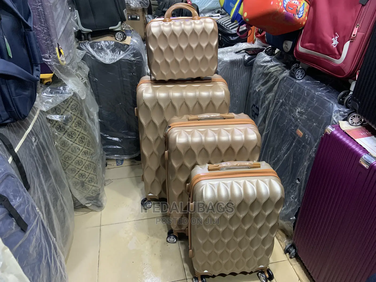 Set of Gold Color Quality Plastic Traveling Luggage With Kit