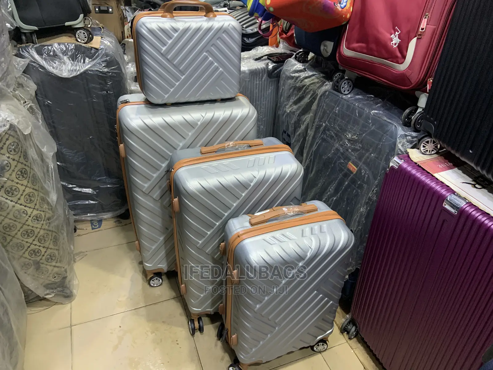 Set of Quality Silver Plastic Traveling Luggage With Kit